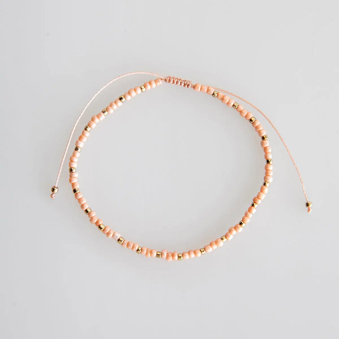 Delicate Pink & Gold Bead Bracelet